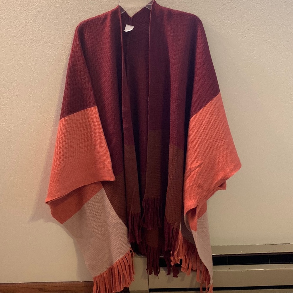 Christopher and Banks open poncho